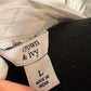 Size L NWT white top with ruffles