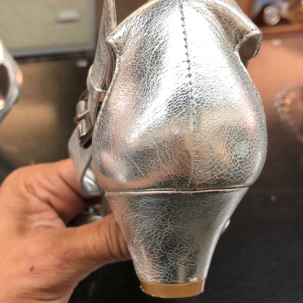 Size 8 medium Nine West Silver low heels