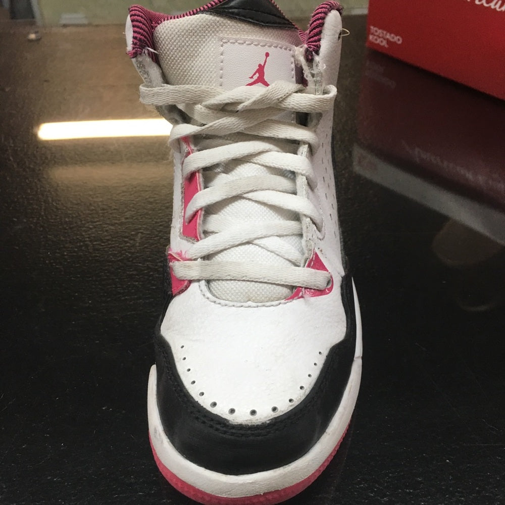 Pink, black and white Jordan’s size 11.5