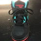 Black, orange and blue Nike’s size 12c sneakers