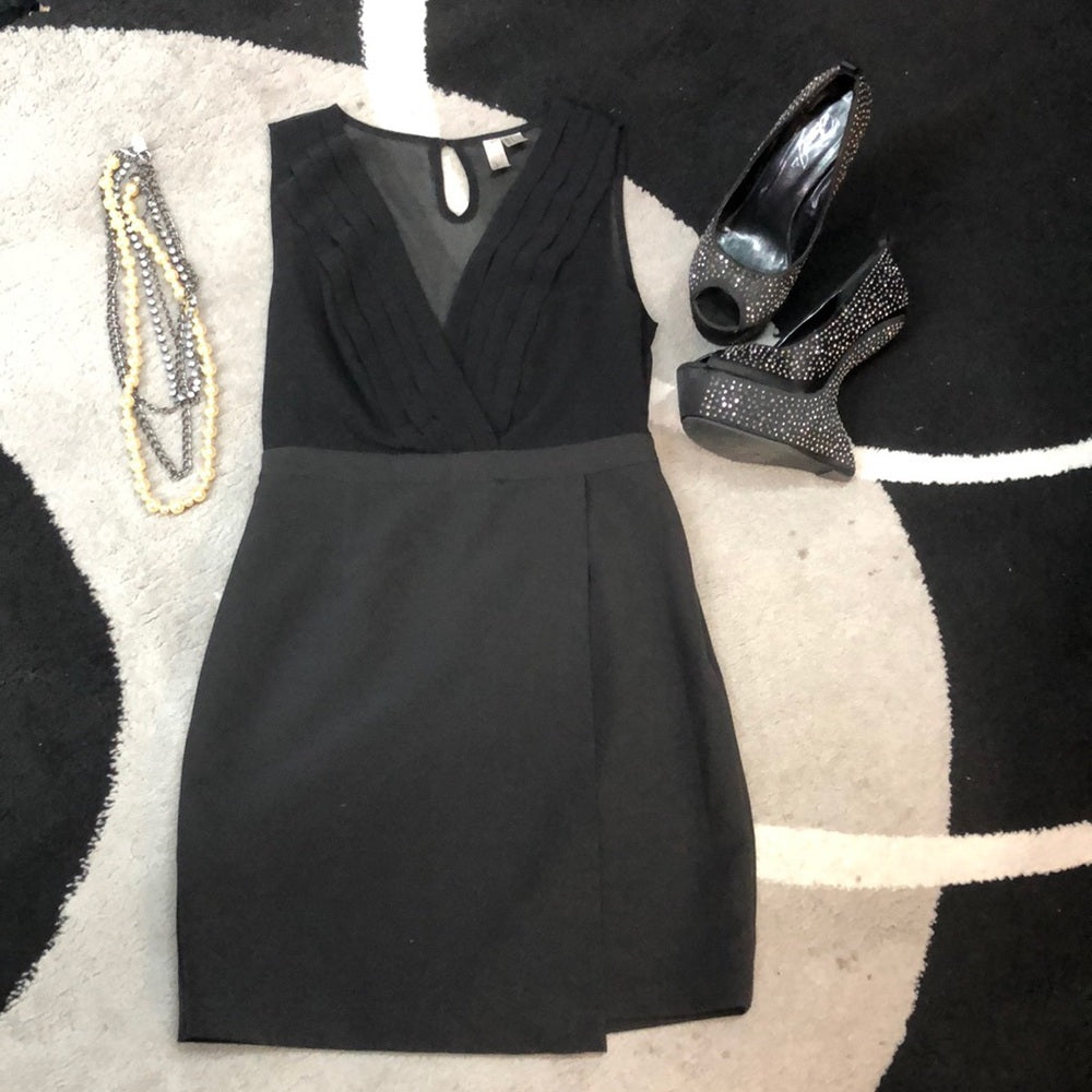Size small Black dress. Sheet back