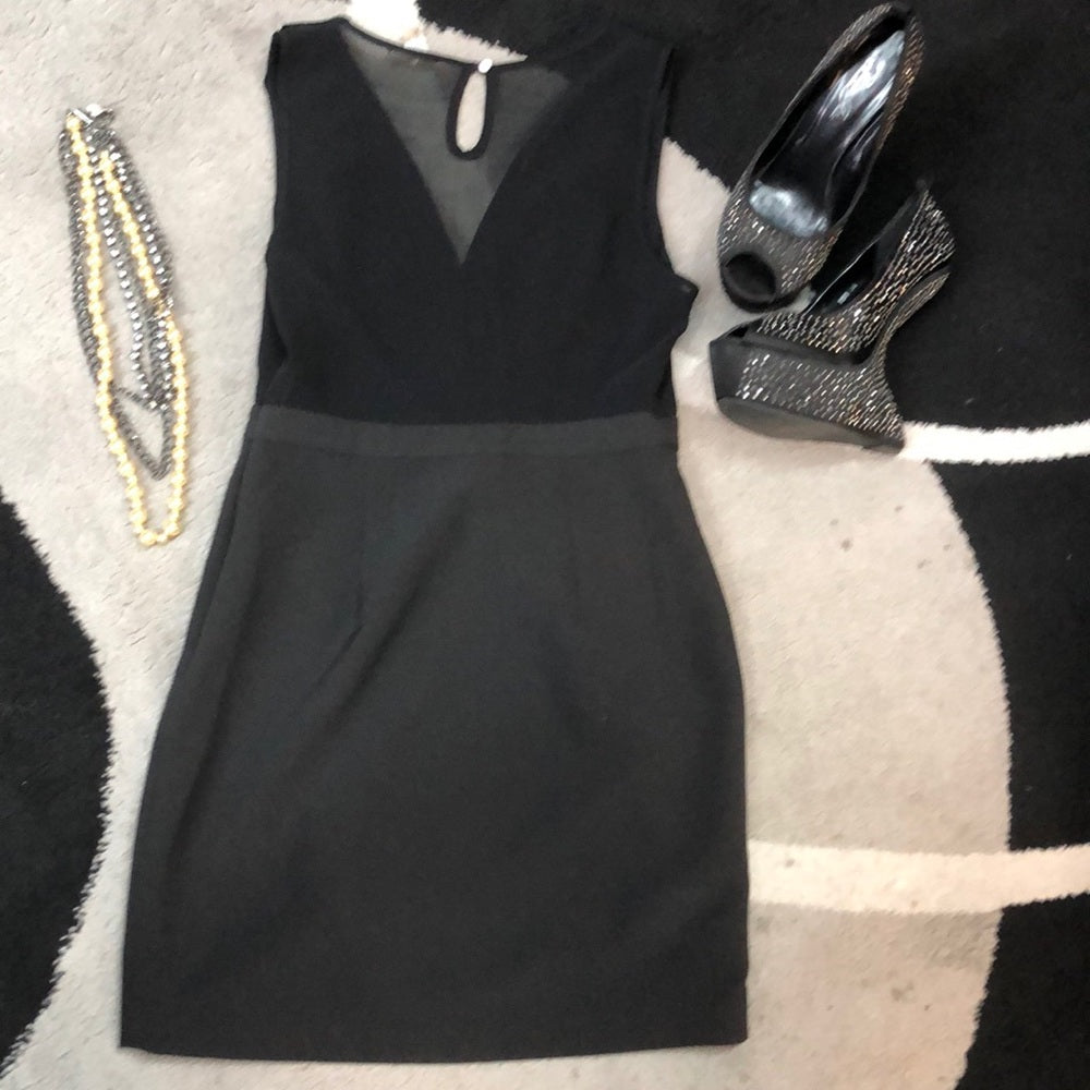 Size small Black dress. Sheet back