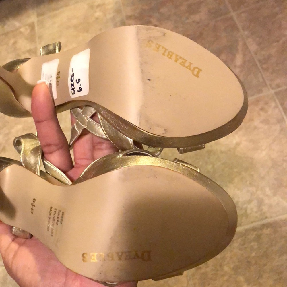 Size 6.5B gold w/ rhinestones platform