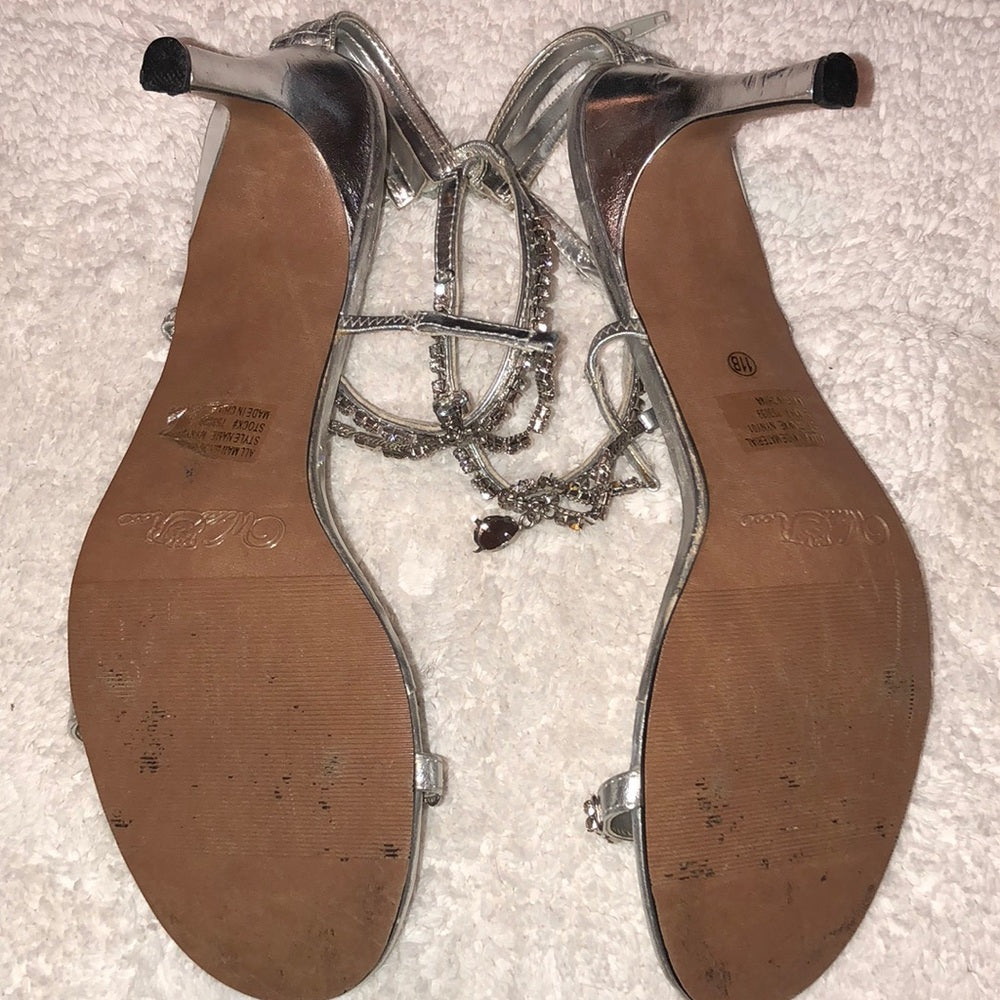 Size 11 Wild Rose silver heels.