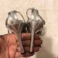 Size 11 Wild Rose silver heels.