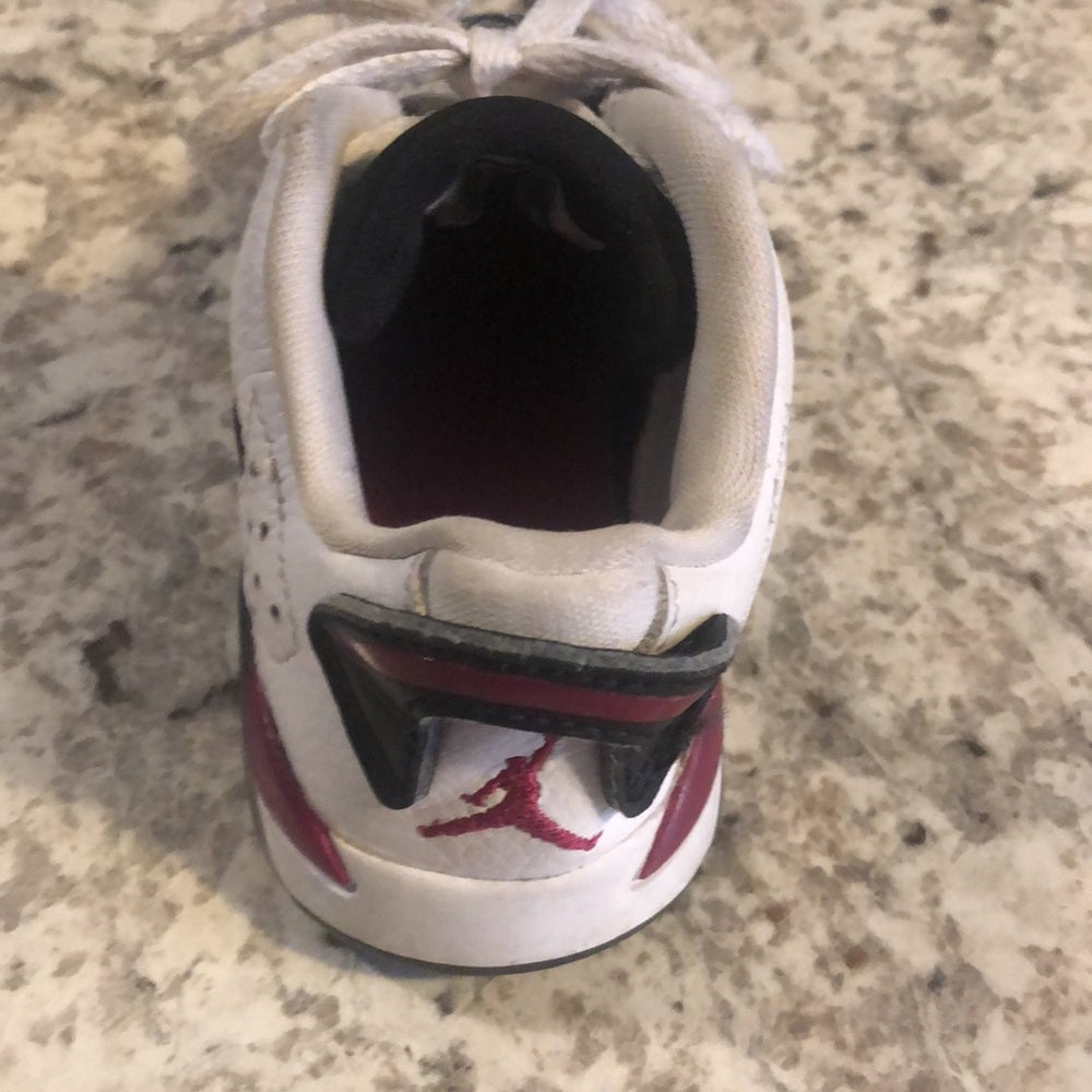 Jordan’s sz 7c white, black and purple sneakers