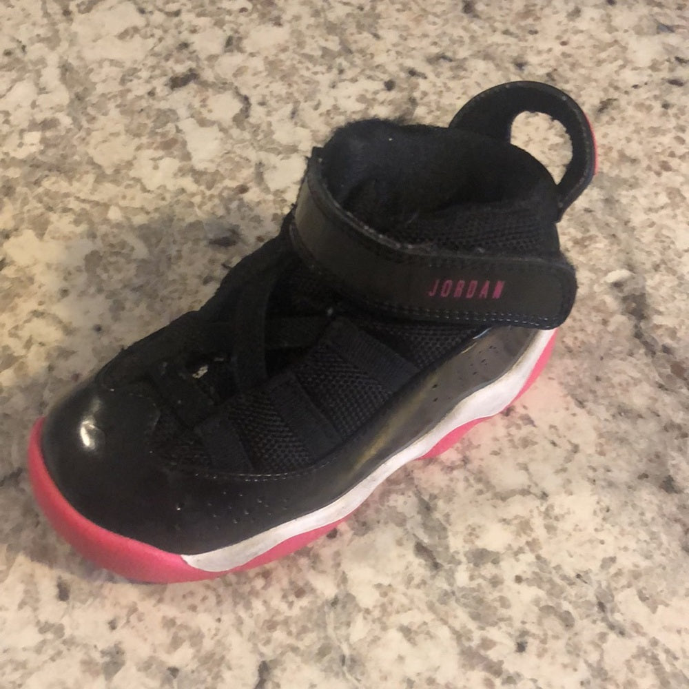 Jordan’s sz 7C pink, black and white sneakers