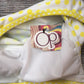 OP sz small/ch yellow & white bathing suit top